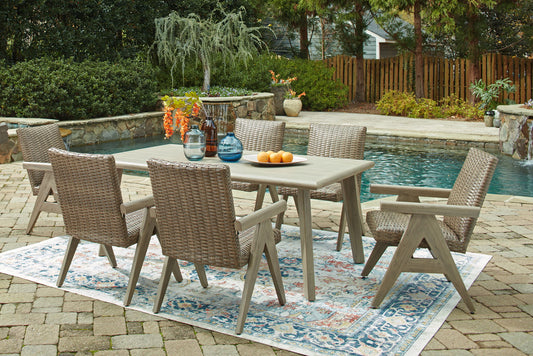 Carisbo - 7 Pc. - Dining Table With Umbrella Option, 4 Arm Chairs, 2 Rocking Arm Chairs - Beige