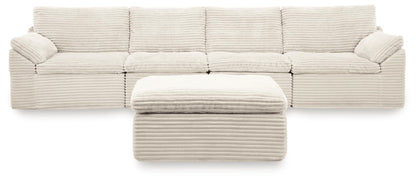 Canefield - 4-Piece Sectional With Ottoman - Ivory
