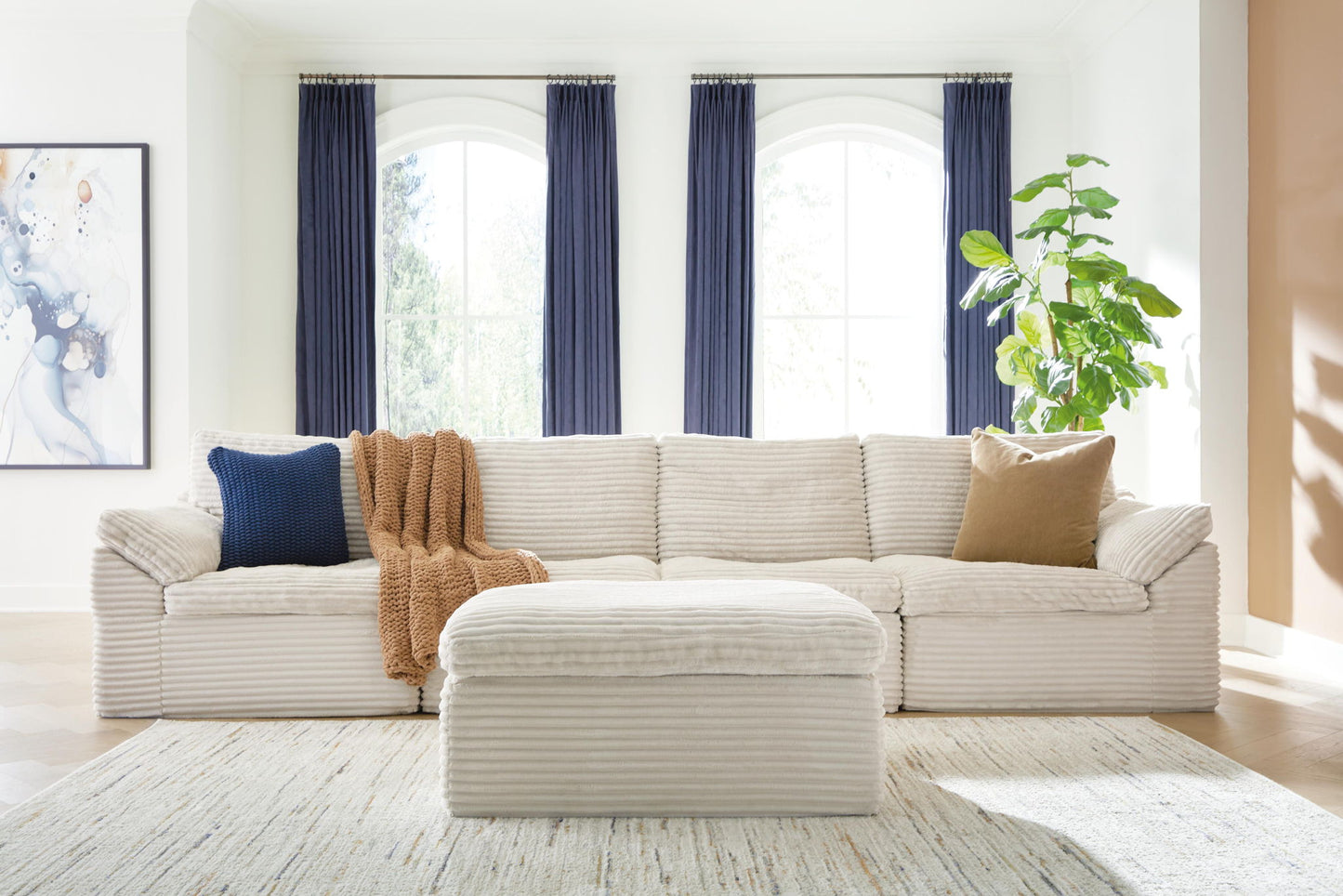 Canefield - 4-Piece Sectional With Ottoman - Ivory