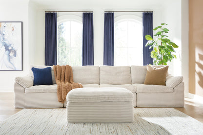 Canefield - 4-Piece Sectional With Ottoman - Ivory